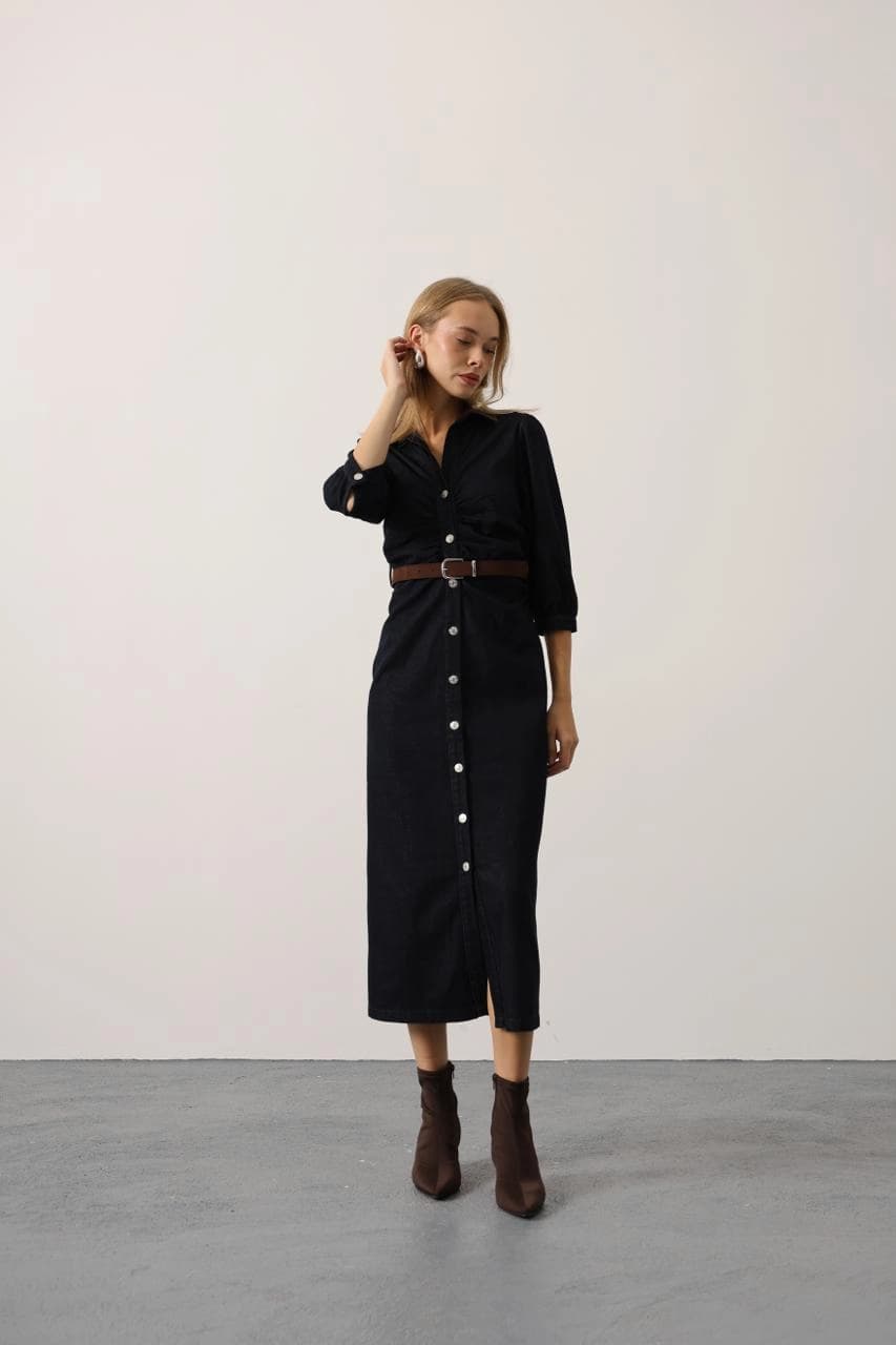 Black midi shirt dress for women featuring a button-front, collar, cuffed long sleeves, and a chic brown belt. Versat...