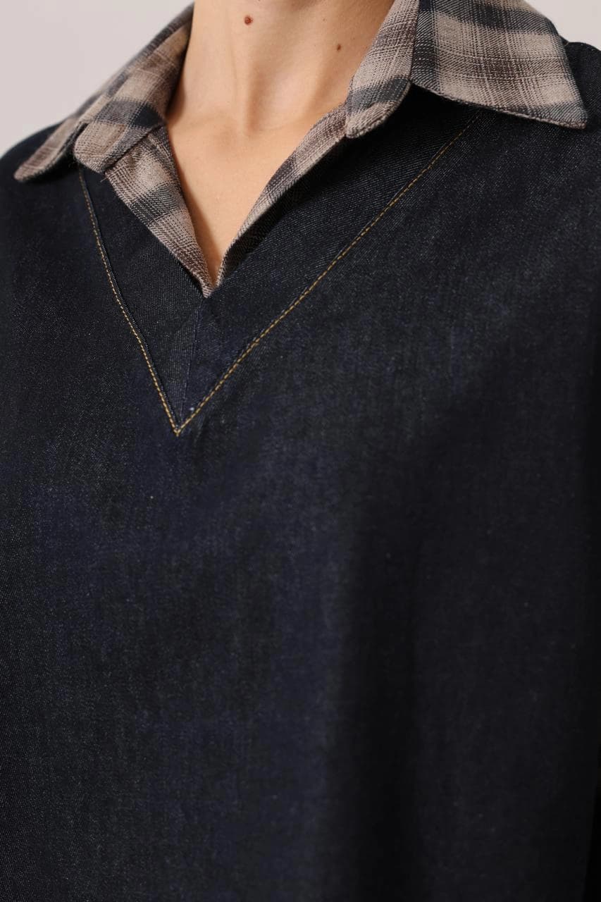 Charcoal jean upper, angular garment opening, amber seamwork. Ash-toned checkered underlayer, grunge-inspired.