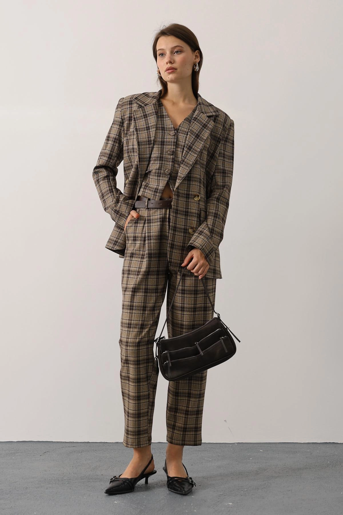 Power in Plaid: The Three-Piece Suit That Redefines Modern Elegance